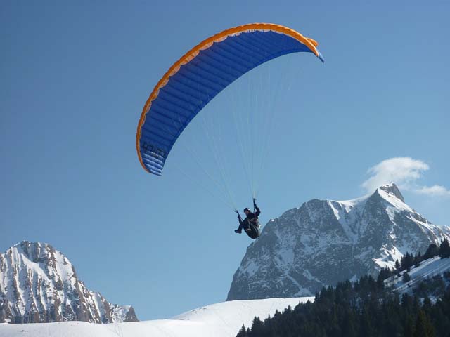 Winter paragliding in the French Alps